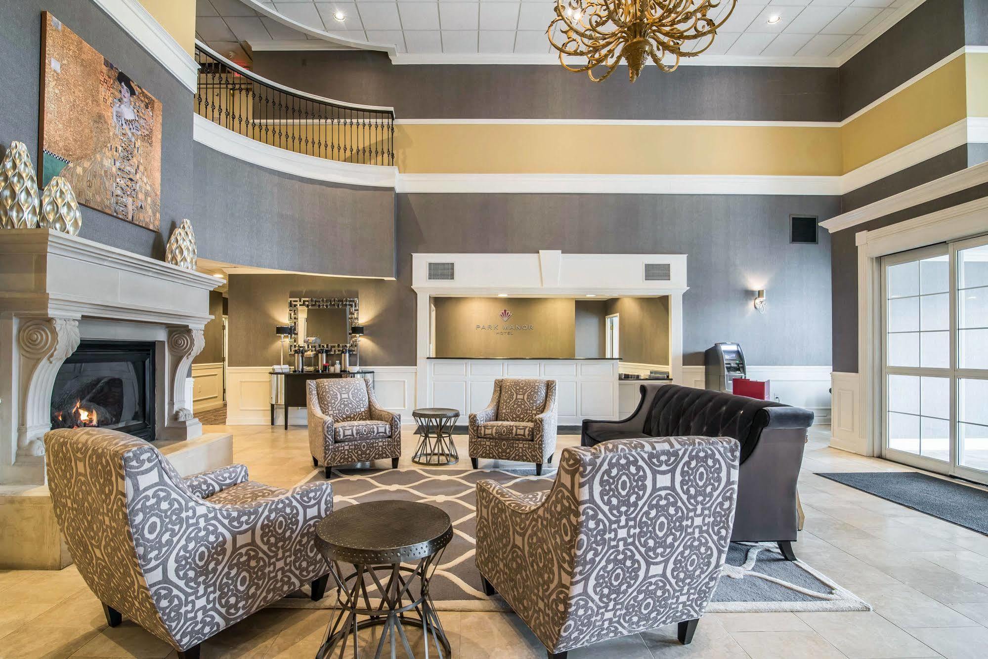 Park Manor Hotel Clifton Park Eksteriør billede The lobby of the Best Western Premier Executive Residency Royal Palm Beach